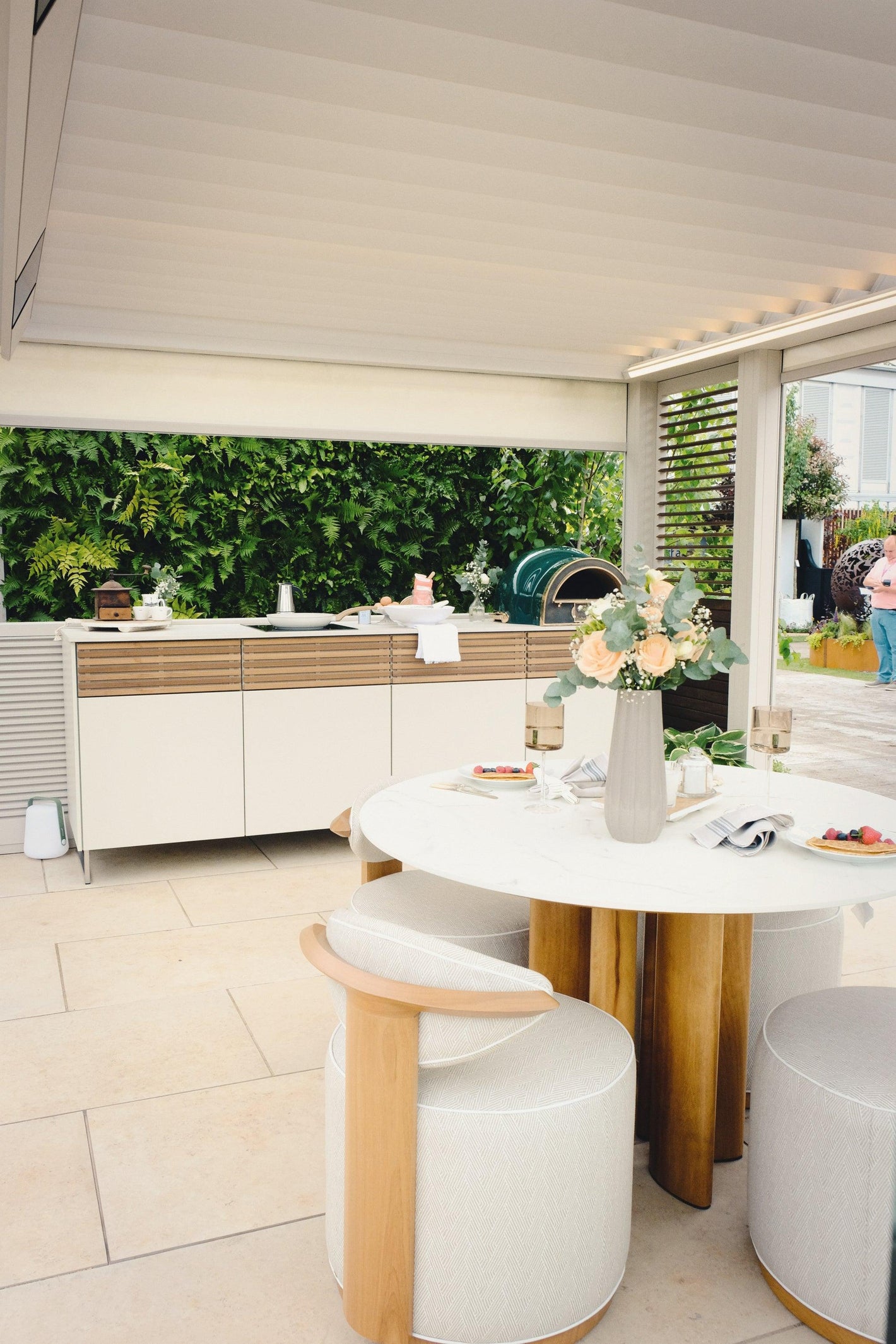 Coco_Wolf_tamarindo_dining_round_table_and_swivel_chairs_by_Garden_House_Design_at_the_RHS_Chelsea_Flower_Show_2023_3 - Garden House Design